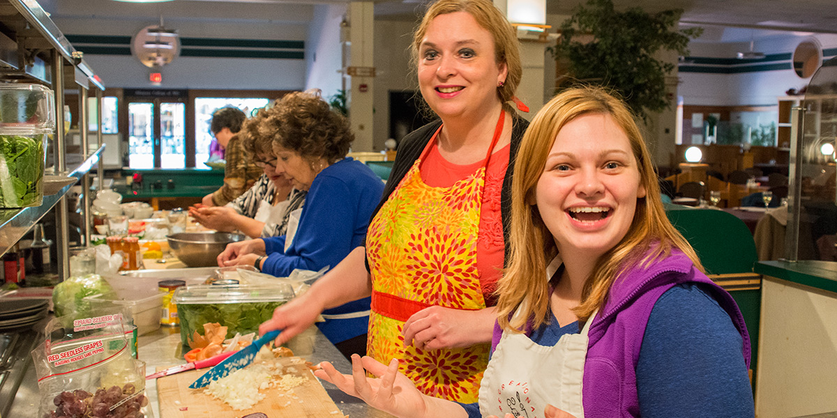 Multiple students in a cooking environment