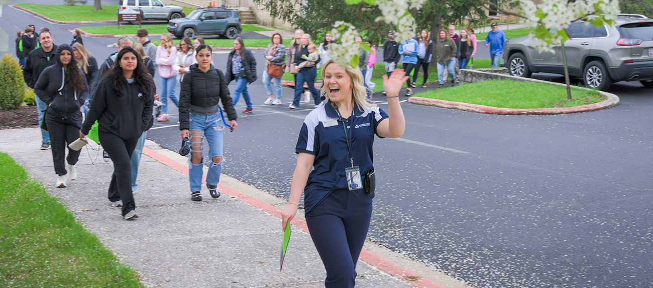ACM Recruiter leading a tour