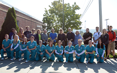 ACM Bedford County Campus students, faculty & staff at college entrance