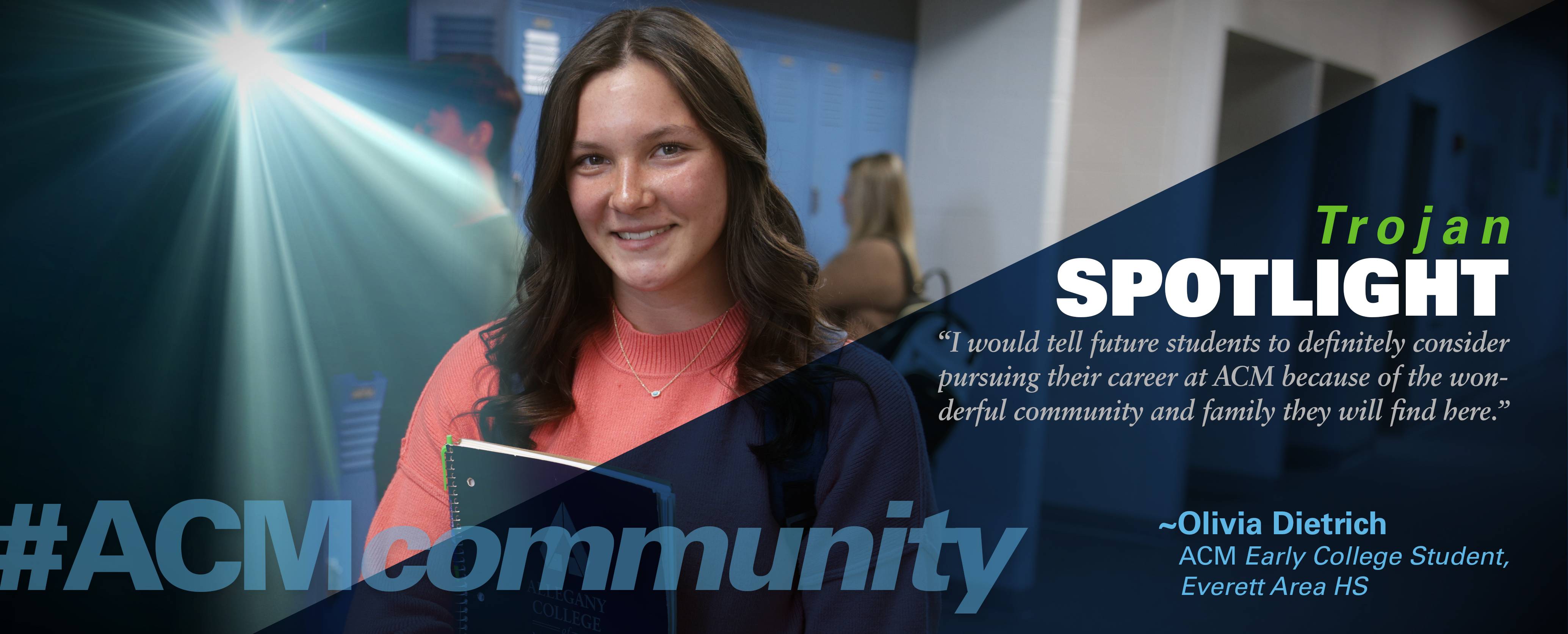 Female student standing in front of lockers.
